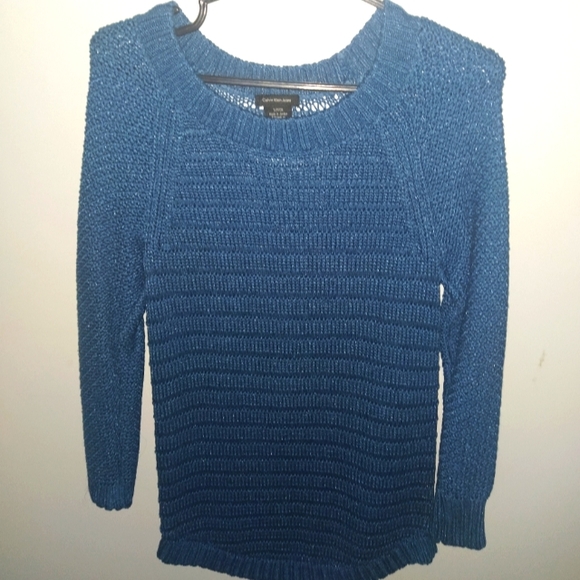 Long knitted blue sweater